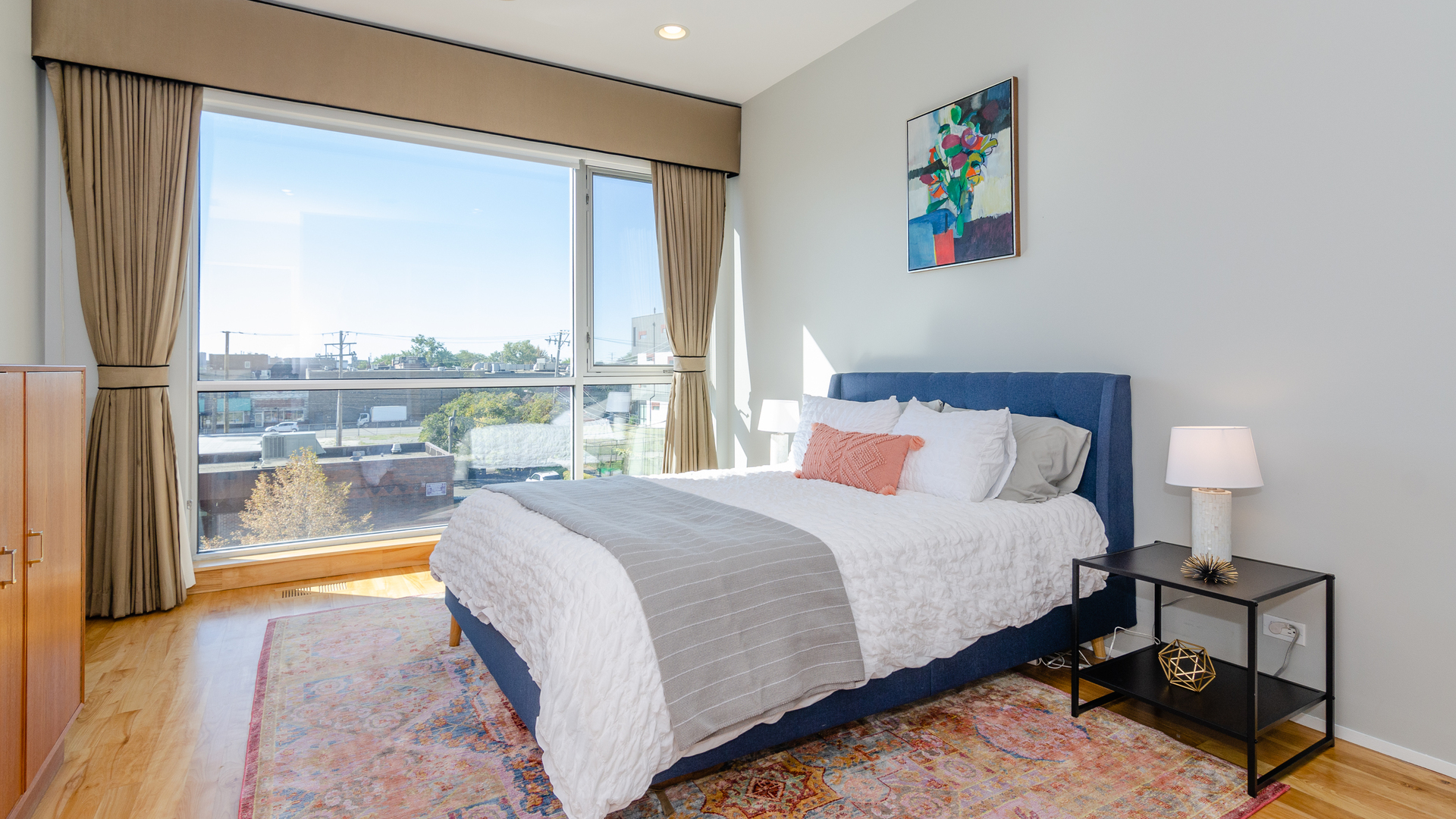 2408 West Rice Street, Unit 301 Chicago, IL 60622 - Photo 8 of 20 a bedroom with a bed and a window