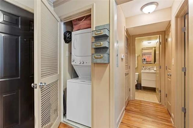 a bathroom with a sink mirror and toilet