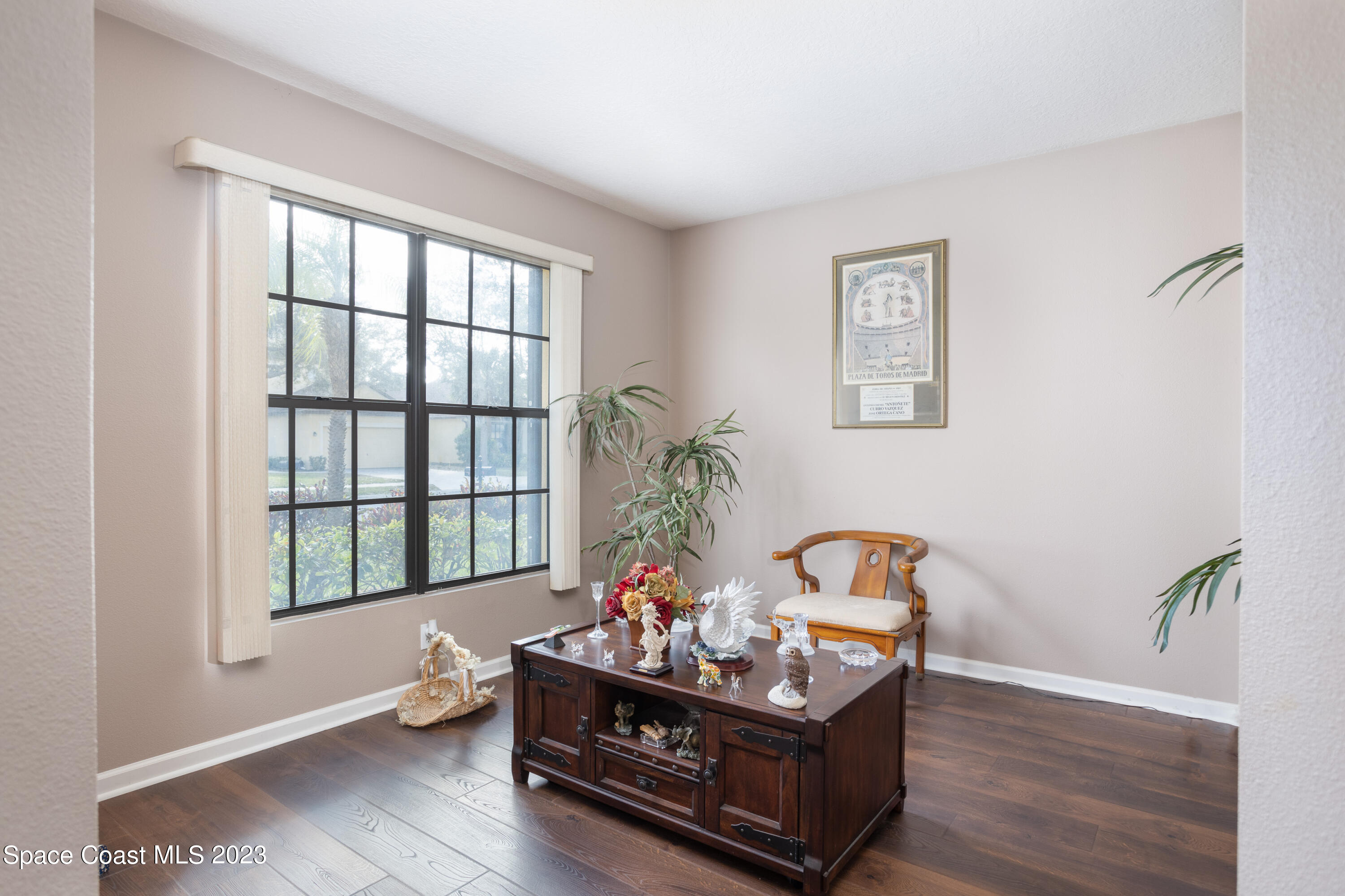 4130 Millicent Circle Melbourne, FL 32901 - Photo 6 of 28 a living room with furniture and a window