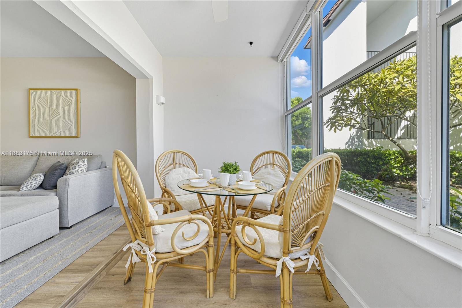 1501 South Ocean Boulevard, Unit 117 Lauderdale-by-the-Sea, FL 33062 - Photo 11 of 38 a view of a dining room with furniture window and outside view