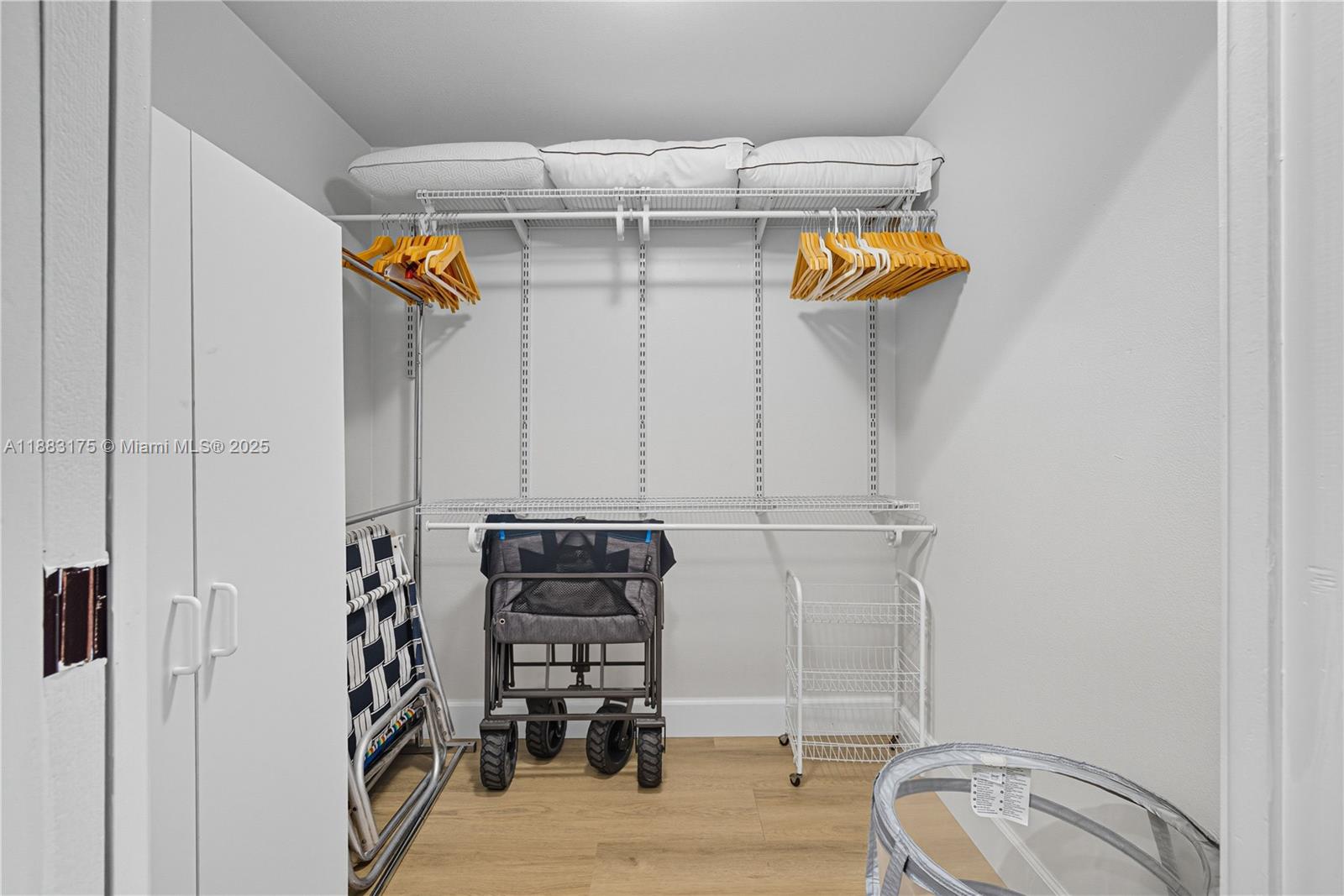 1501 South Ocean Boulevard, Unit 117 Lauderdale-by-the-Sea, FL 33062 - Photo 24 of 38 a utility room with closet