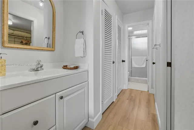 a bathroom with a toilet and shower