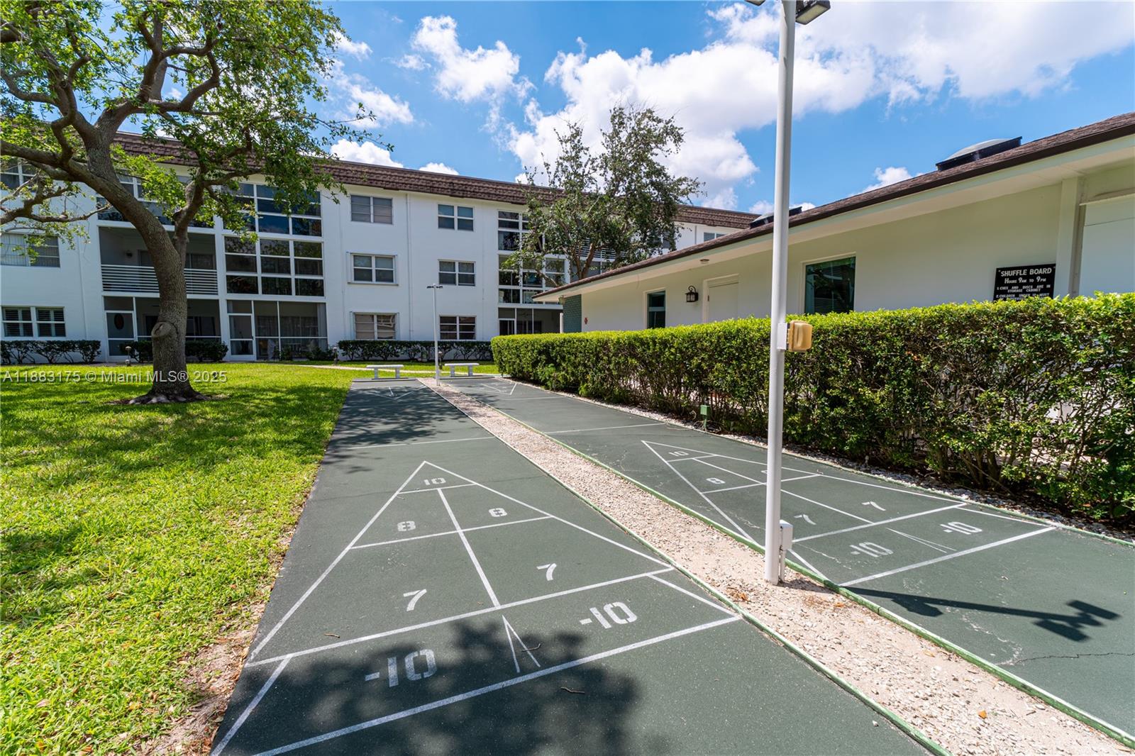 1501 South Ocean Boulevard, Unit 117 Lauderdale-by-the-Sea, FL 33062 - Photo 30 of 38 a view of a patio with a yard