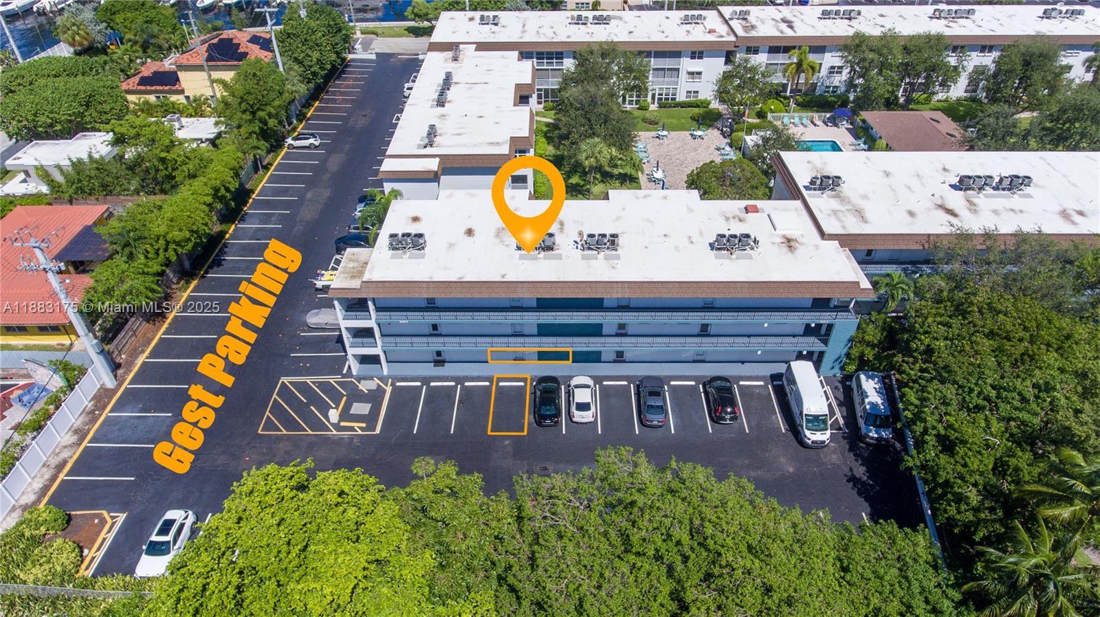 1501 South Ocean Boulevard, Unit 117 Lauderdale-by-the-Sea, FL 33062 - Photo 3 of 38 an aerial view of a chairs and table on the patio