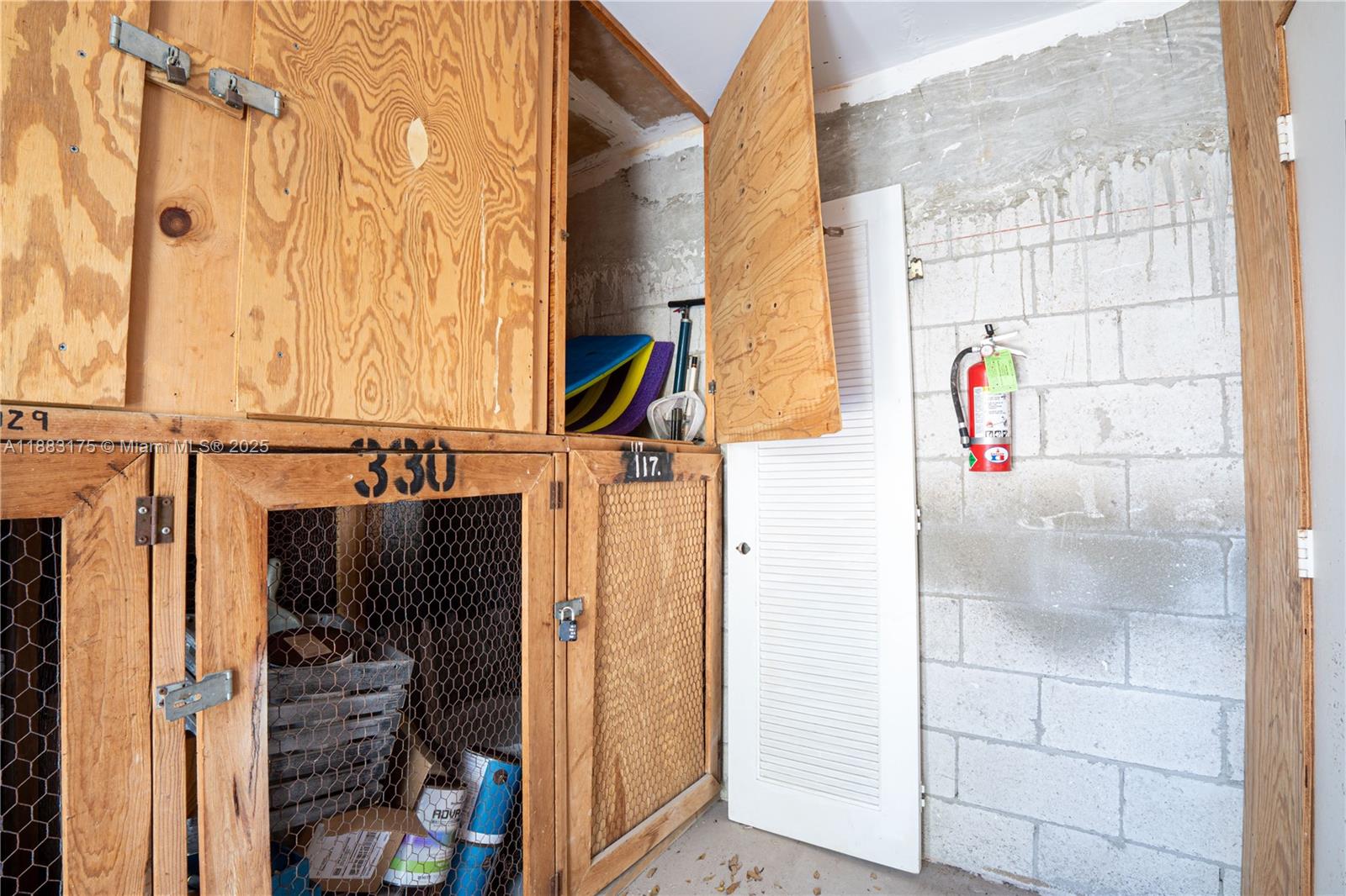 1501 South Ocean Boulevard, Unit 117 Lauderdale-by-the-Sea, FL 33062 - Photo 33 of 38 a view of walk in closet with rug