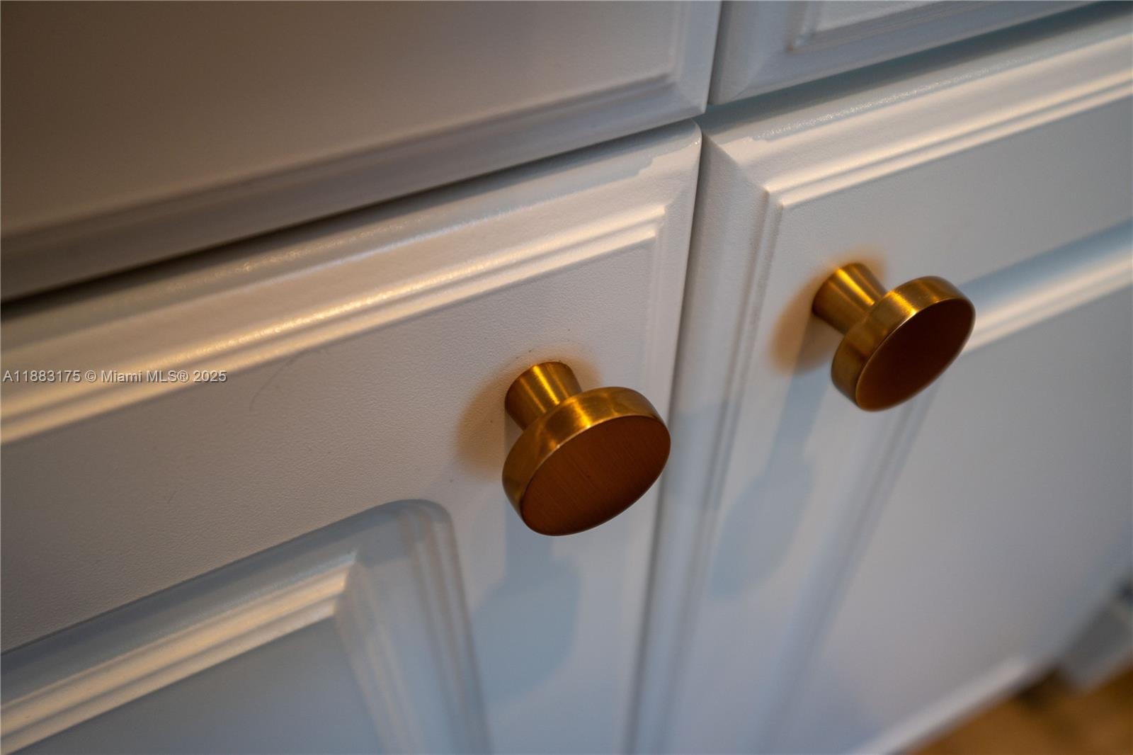 1501 South Ocean Boulevard, Unit 117 Lauderdale-by-the-Sea, FL 33062 - Photo 35 of 38 a close view of shoes stand and wooden floor