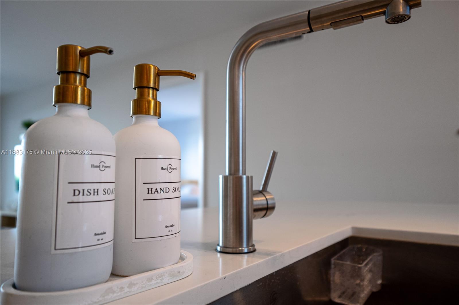 1501 South Ocean Boulevard, Unit 117 Lauderdale-by-the-Sea, FL 33062 - Photo 36 of 38 a view of storage and utility room with racks on the wall