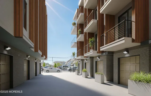 a kitchen with a sink stove and a dining table with chairs