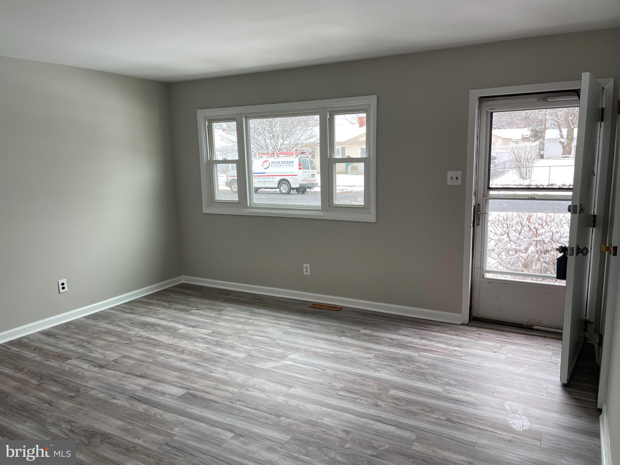135 Garrett Road Newark, DE 19713 - Photo 3 of 32 a view of an empty room with a window