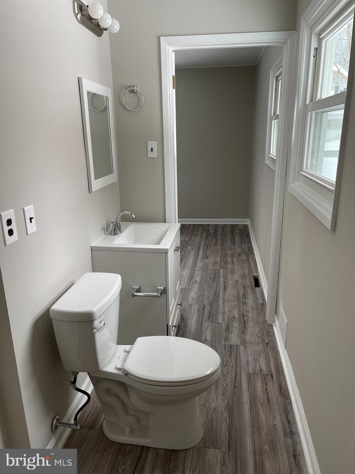 135 Garrett Road Newark, DE 19713 - Photo 26 of 32 a white toilet sitting next to a bathroom sink