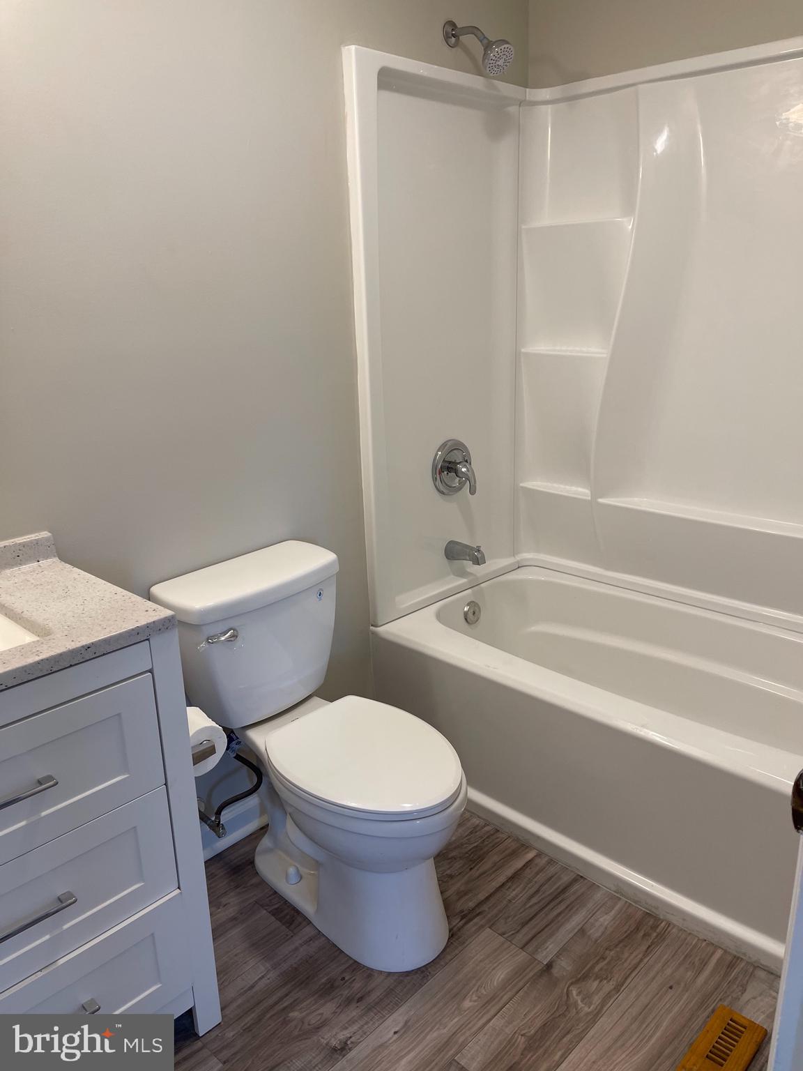 135 Garrett Road Newark, DE 19713 - Photo 27 of 32 a white toilet sitting next to a bath tub