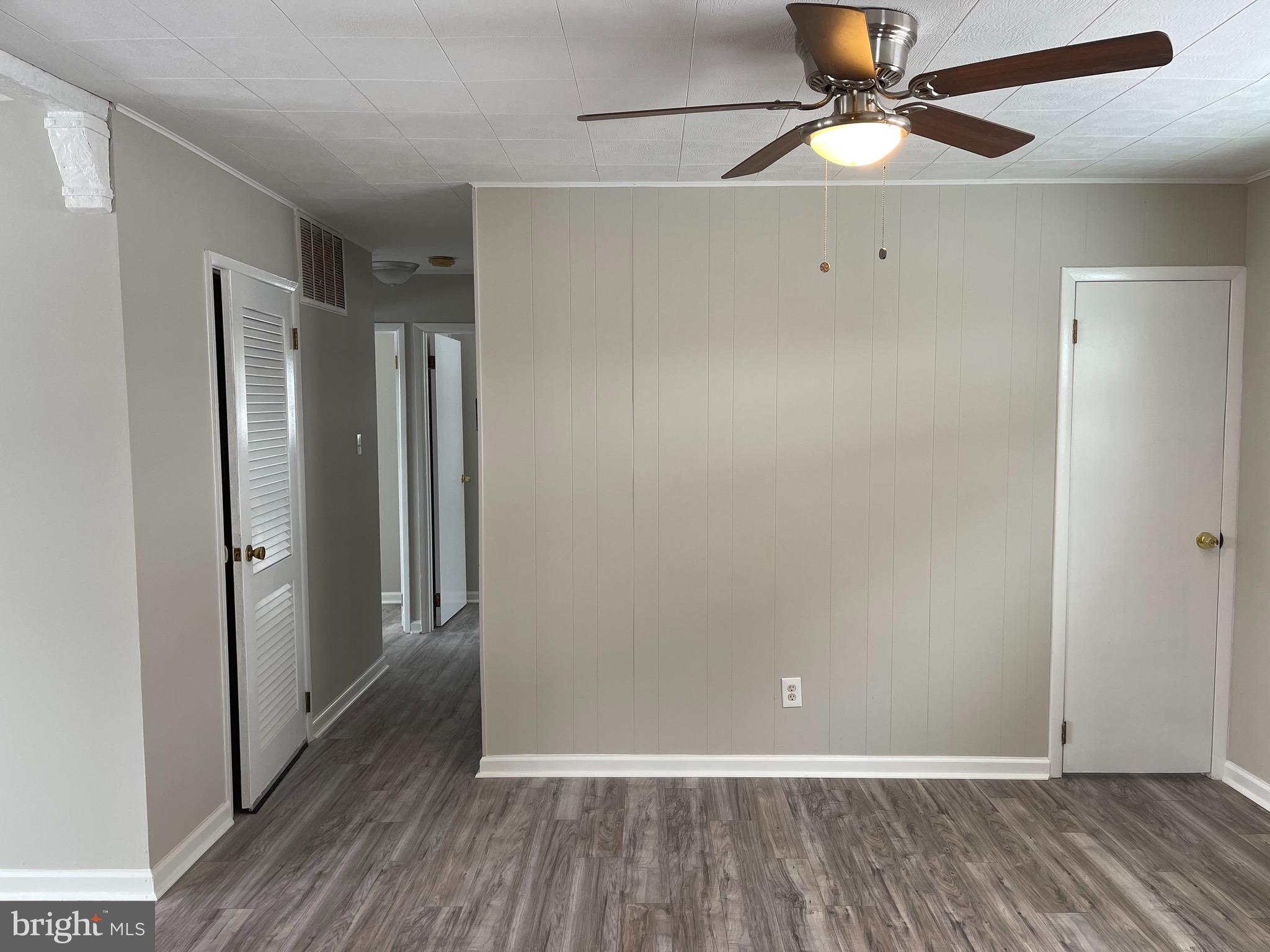 135 Garrett Road Newark, DE 19713 - Photo 7 of 32 a view of an empty room with wooden floor