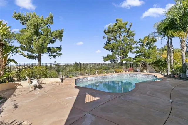a view of a house with a swimming pool