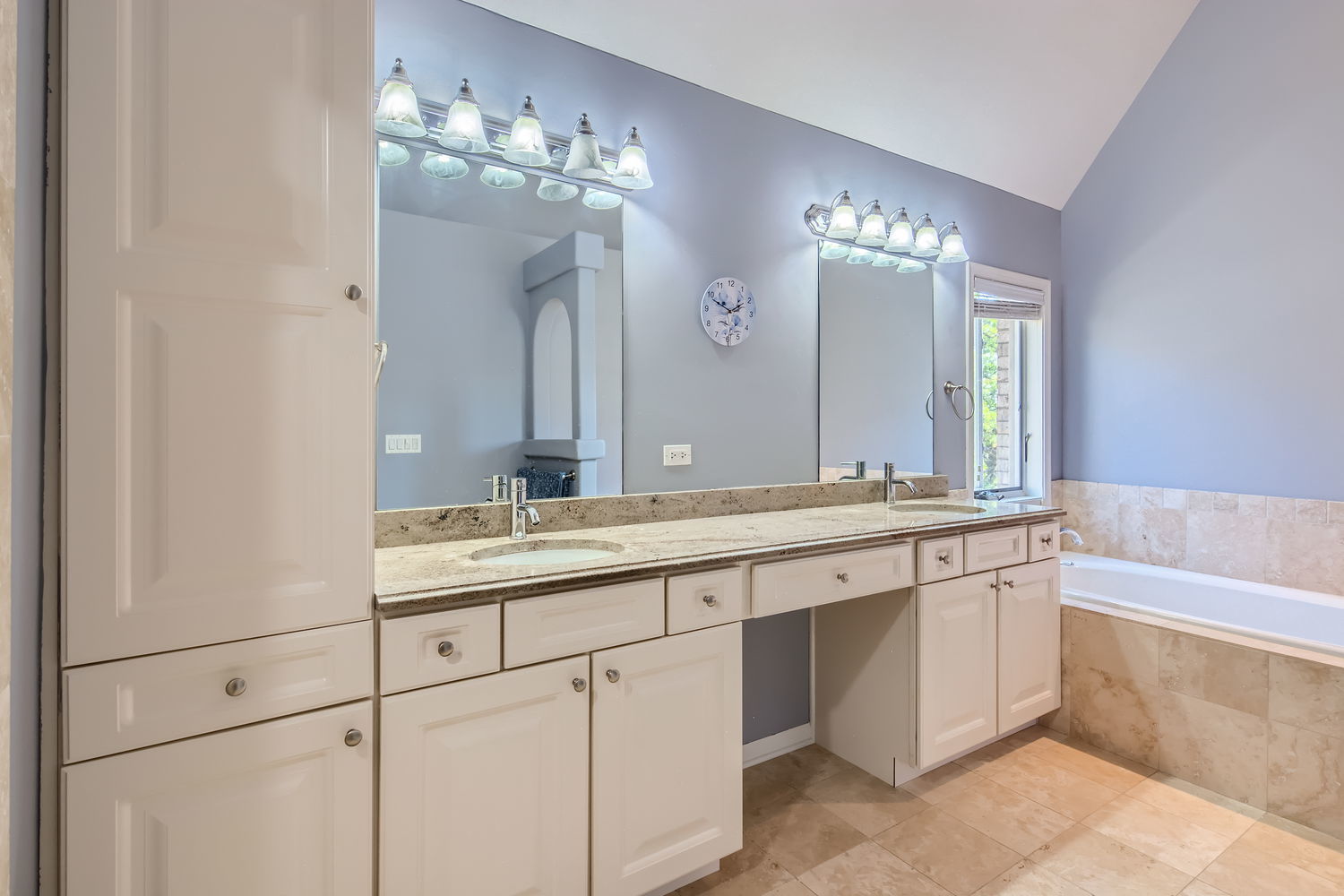 1419 Rue Paris Place Inverness, IL 60067 - Photo 18 of 28 a bathroom with a double vanity sink and a mirror