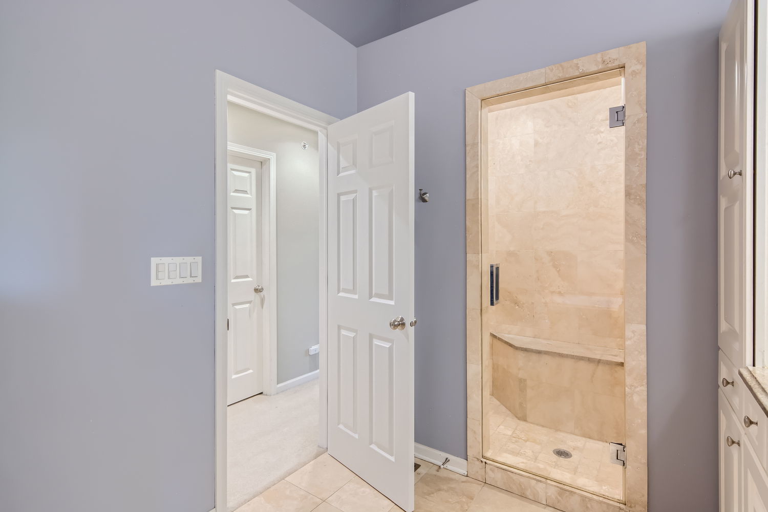 1419 Rue Paris Place Inverness, IL 60067 - Photo 19 of 28 a bathroom with a glass shower door