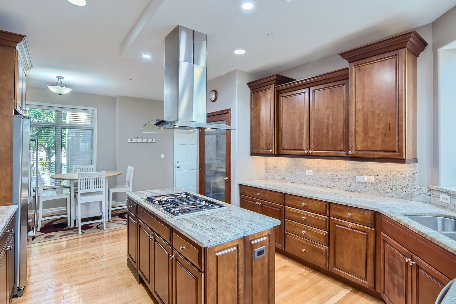 1419 Rue Paris Place Inverness, IL 60067 - Photo 10 of 28 a kitchen with a stove and a sink