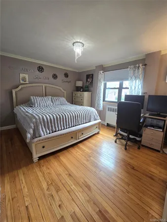 a room with a bed and window
