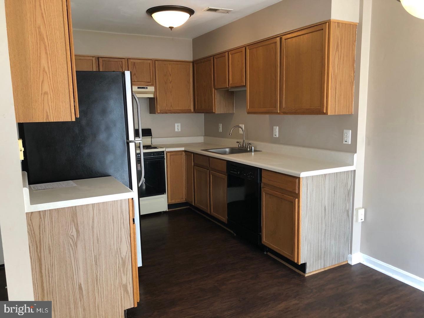 122 Bishopstone Circle Frederick, MD 21702 - Photo 2 of 9 a kitchen with stainless steel appliances a refrigerator and a sink