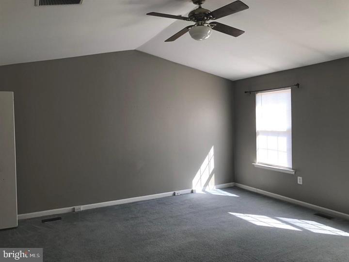 122 Bishopstone Circle Frederick, MD 21702 - Photo 5 of 9 an empty room with a window and a fan