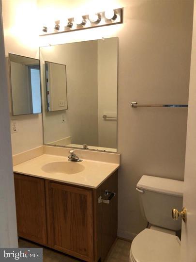 122 Bishopstone Circle Frederick, MD 21702 - Photo 8 of 9 a bathroom with a sink toilet and mirror