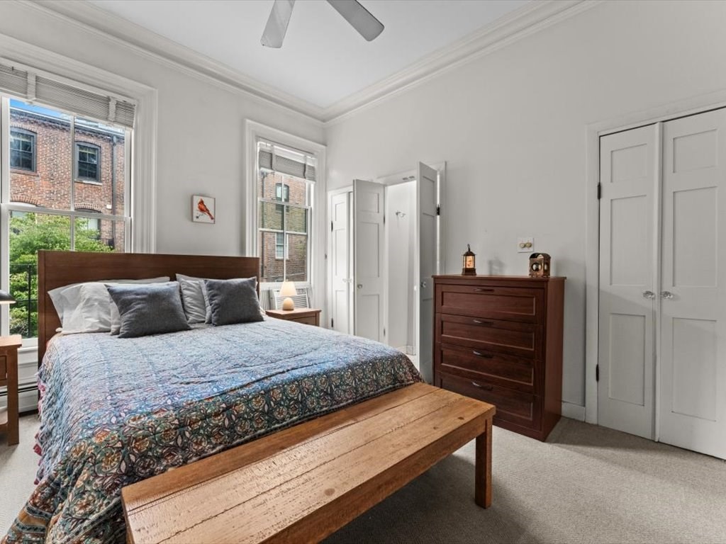 103 Appleton Street, Unit 3 Boston, MA 02116 - Photo 13 of 24 a bedroom with a bed and dresser