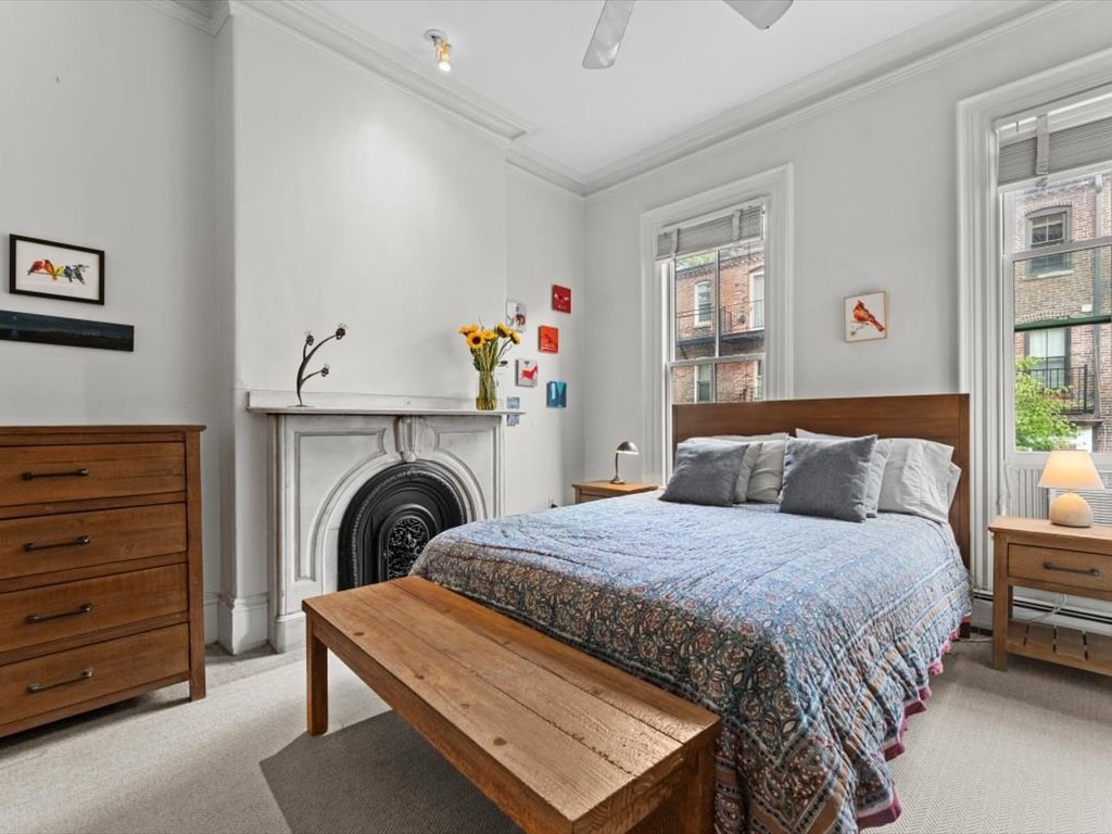 103 Appleton Street, Unit 3 Boston, MA 02116 - Photo 15 of 24 a bedroom with a bed and a window