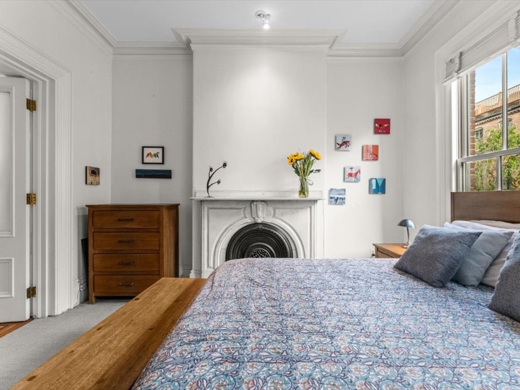 103 Appleton Street, Unit 3 Boston, MA 02116 - Photo 18 of 24 a bedroom with a bed and a dresser