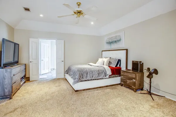 a bedroom with a bed and furniture
