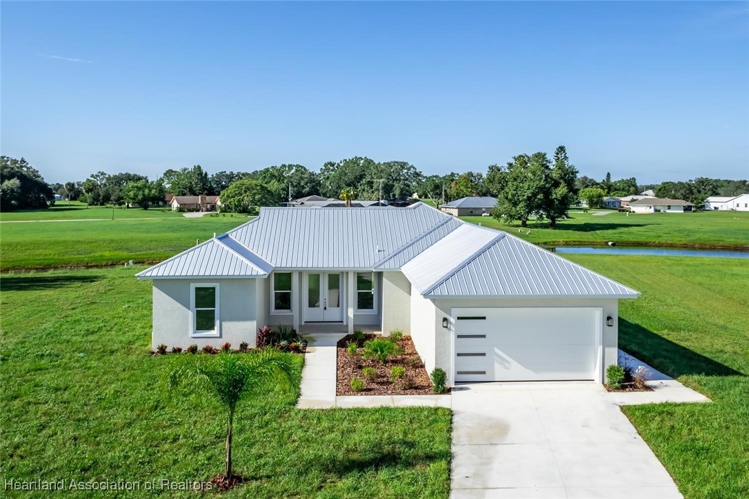 8300 Granada Road Sebring, FL 33876 - Photo 1 of 50 FRONT OF HOME