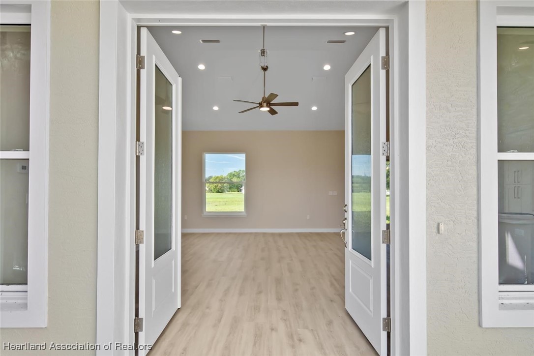 8300 Granada Road Sebring, FL 33876 - Photo 2 of 50 FRONT ENTRANCE TO HOME