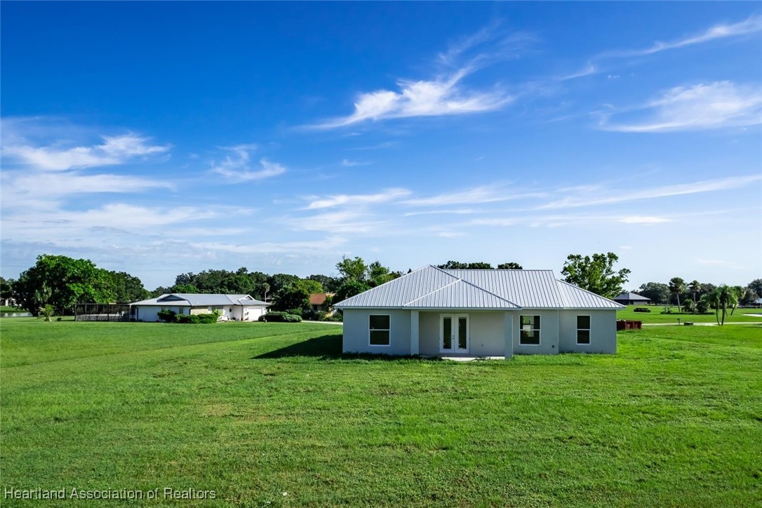 8300 Granada Road Sebring, FL 33876 - Photo 31 of 50 BACK OF HOME