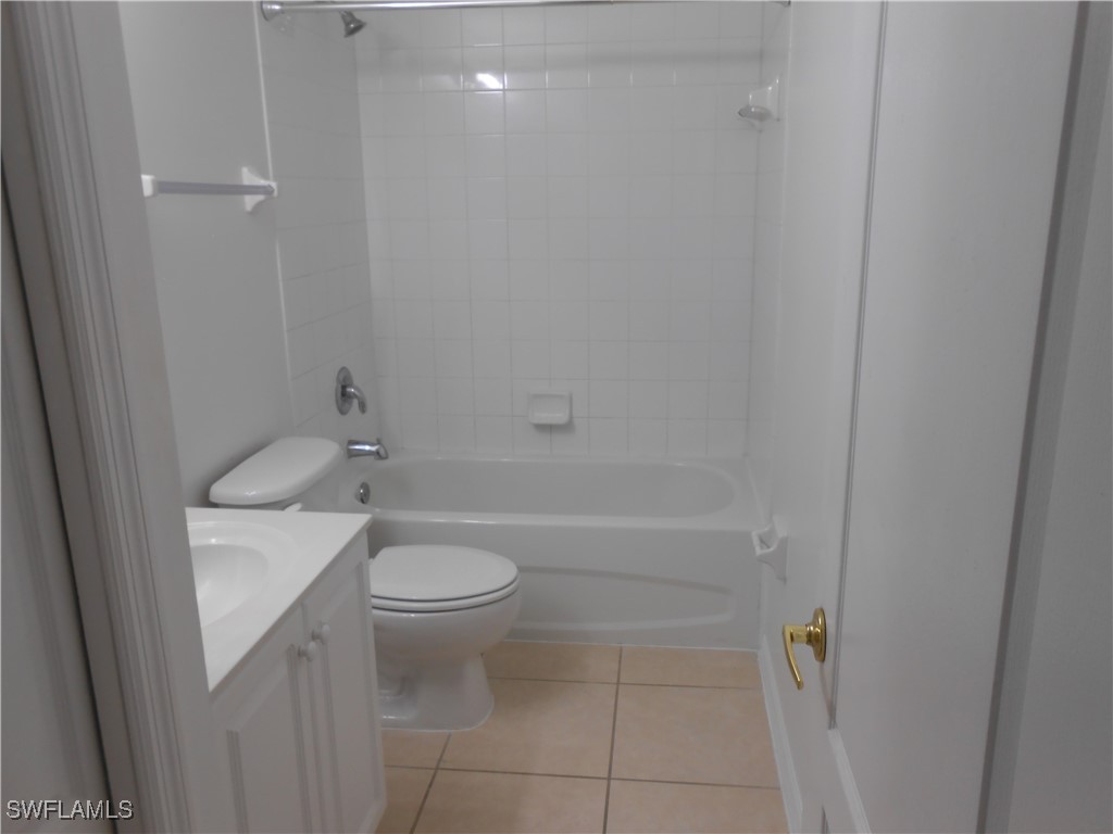 9409 Ivy Brook Run, Unit 1303 Fort Myers, FL 33913 - Photo 14 of 25 a bathroom with a sink a toilet and shower