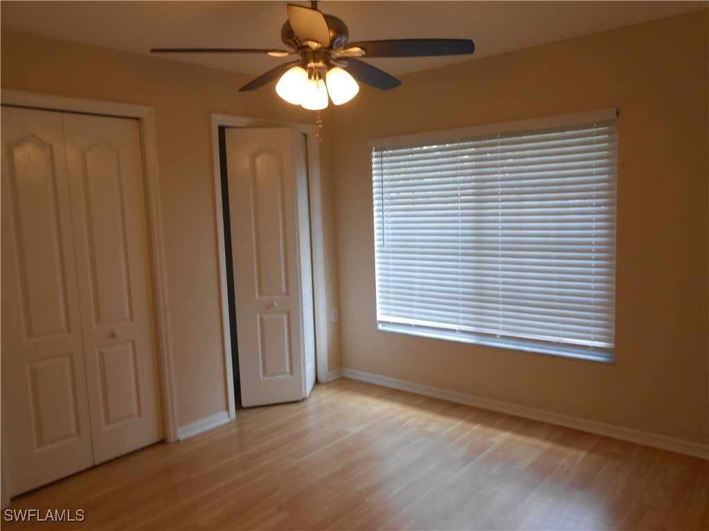 9409 Ivy Brook Run, Unit 1303 Fort Myers, FL 33913 - Photo 16 of 25 a view of an empty room with a window