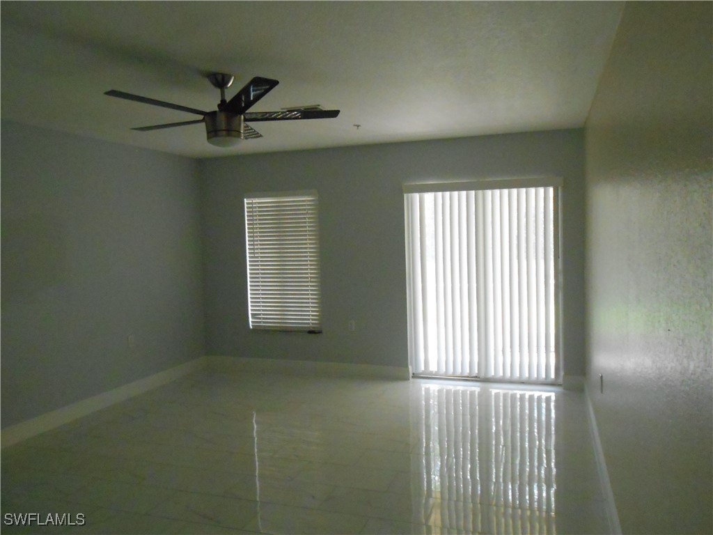 9409 Ivy Brook Run, Unit 1303 Fort Myers, FL 33913 - Photo 8 of 25 a view of a livingroom with a window