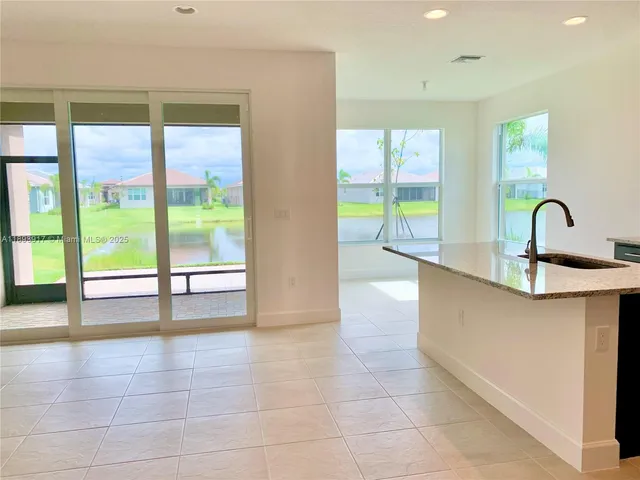 a bathroom with a sink vanity and a mirror