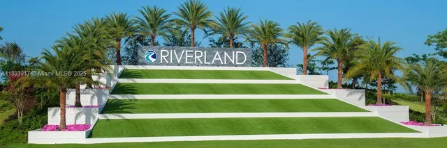 a view of yard with swimming pool and green space