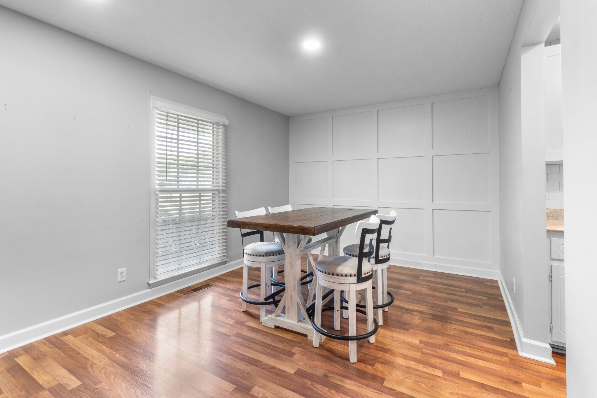 521 Sango Road Clarksville, TN 37043 - Photo 17 of 46 a dining room with furniture and wooden floor