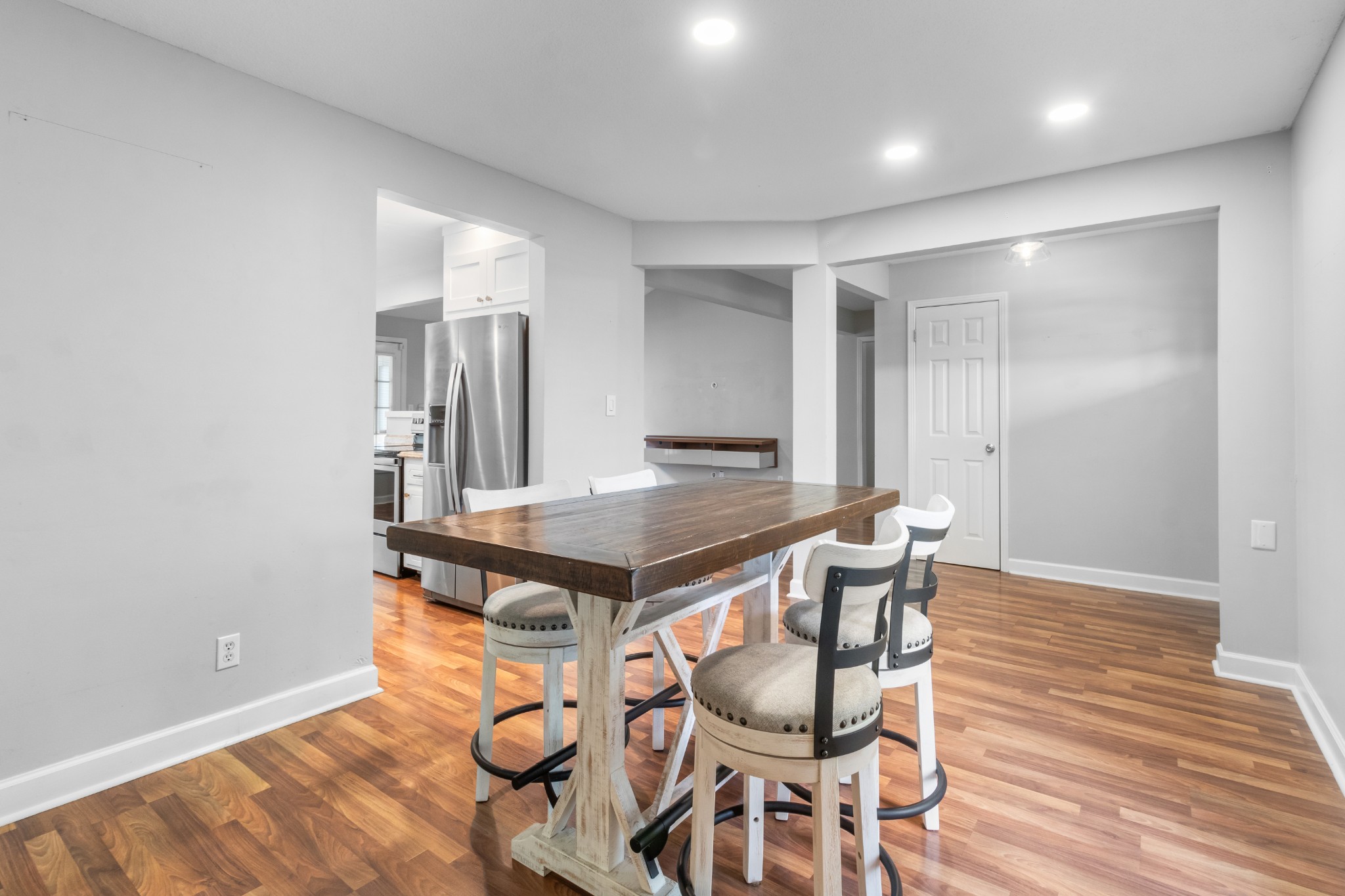 521 Sango Road Clarksville, TN 37043 - Photo 18 of 46 a view of a dining room with furniture and wooden floor