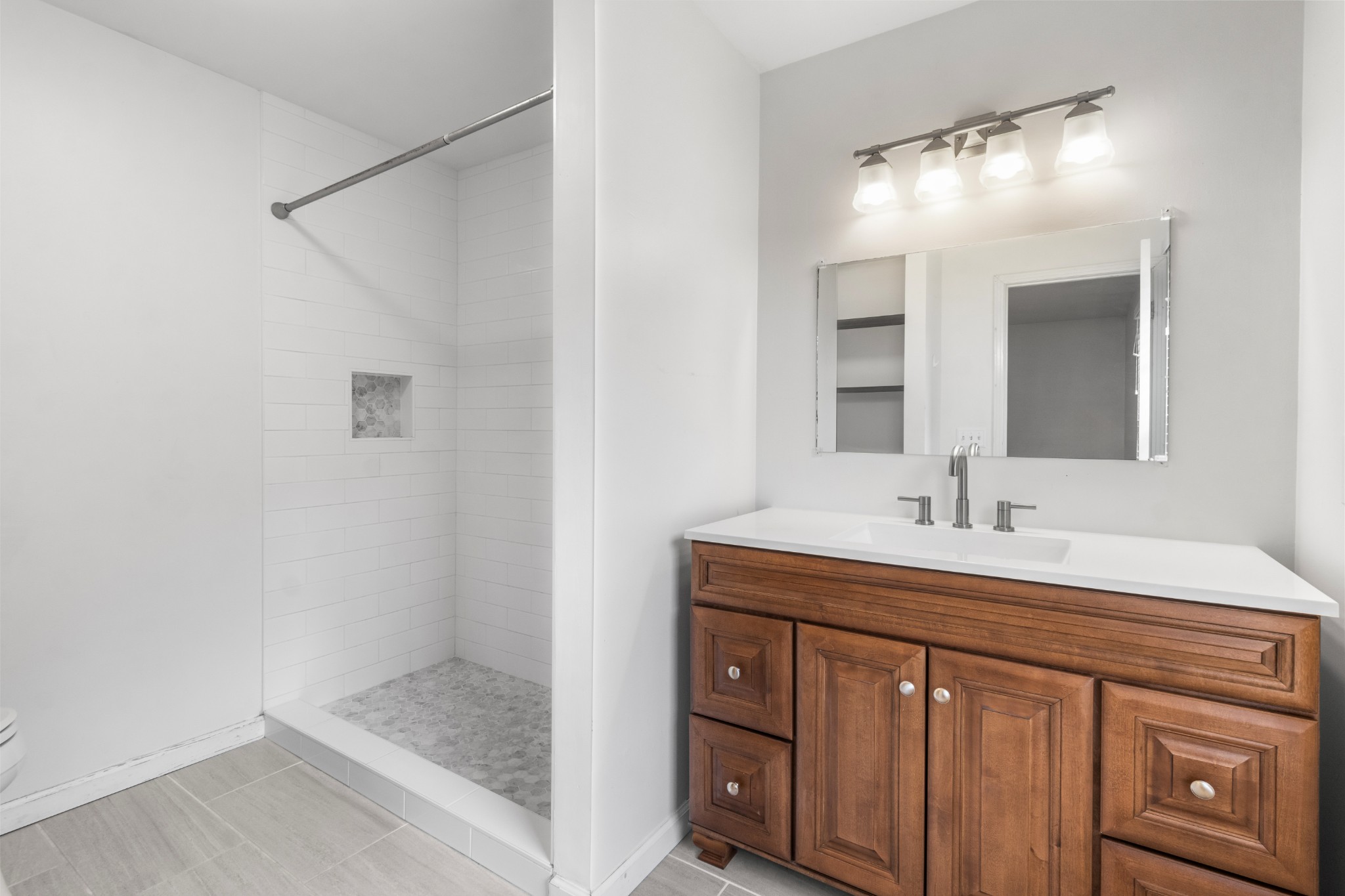 521 Sango Road Clarksville, TN 37043 - Photo 22 of 46 a bathroom with a sink and a mirror