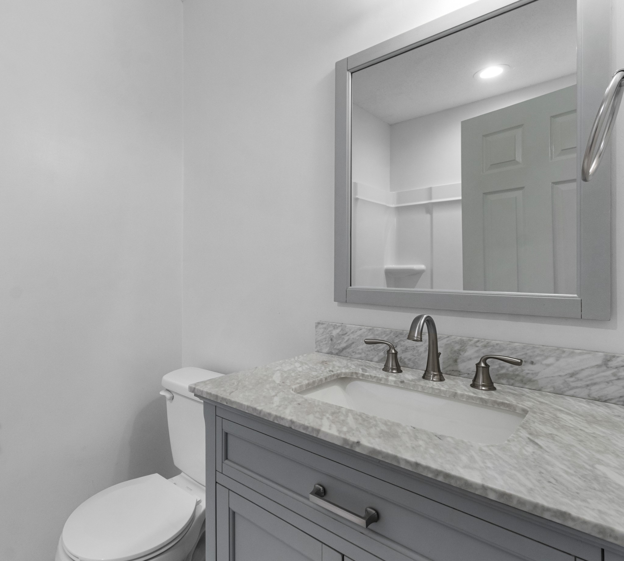 521 Sango Road Clarksville, TN 37043 - Photo 28 of 46 a bathroom with a granite countertop toilet sink and mirror