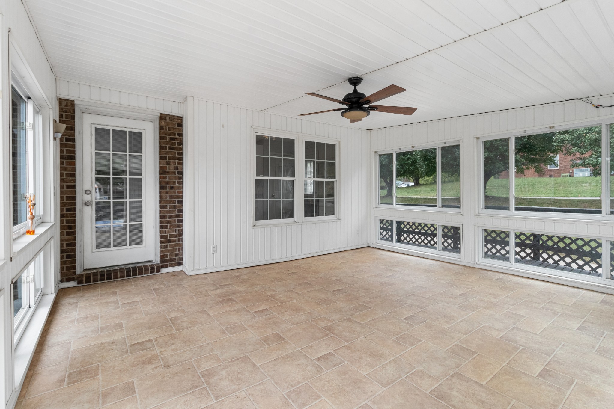 521 Sango Road Clarksville, TN 37043 - Photo 30 of 46 a view of an empty room with a fireplace and a large window