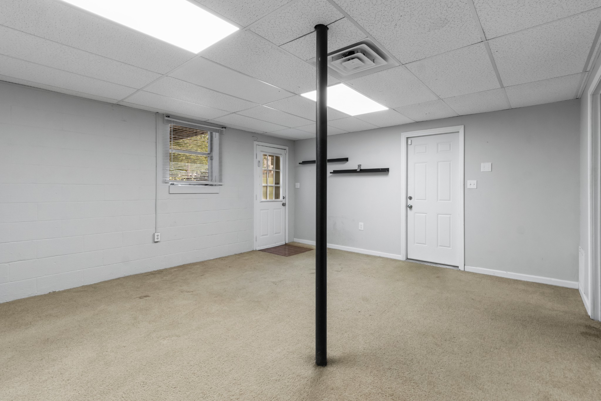 521 Sango Road Clarksville, TN 37043 - Photo 32 of 46 a view of an empty room with a window