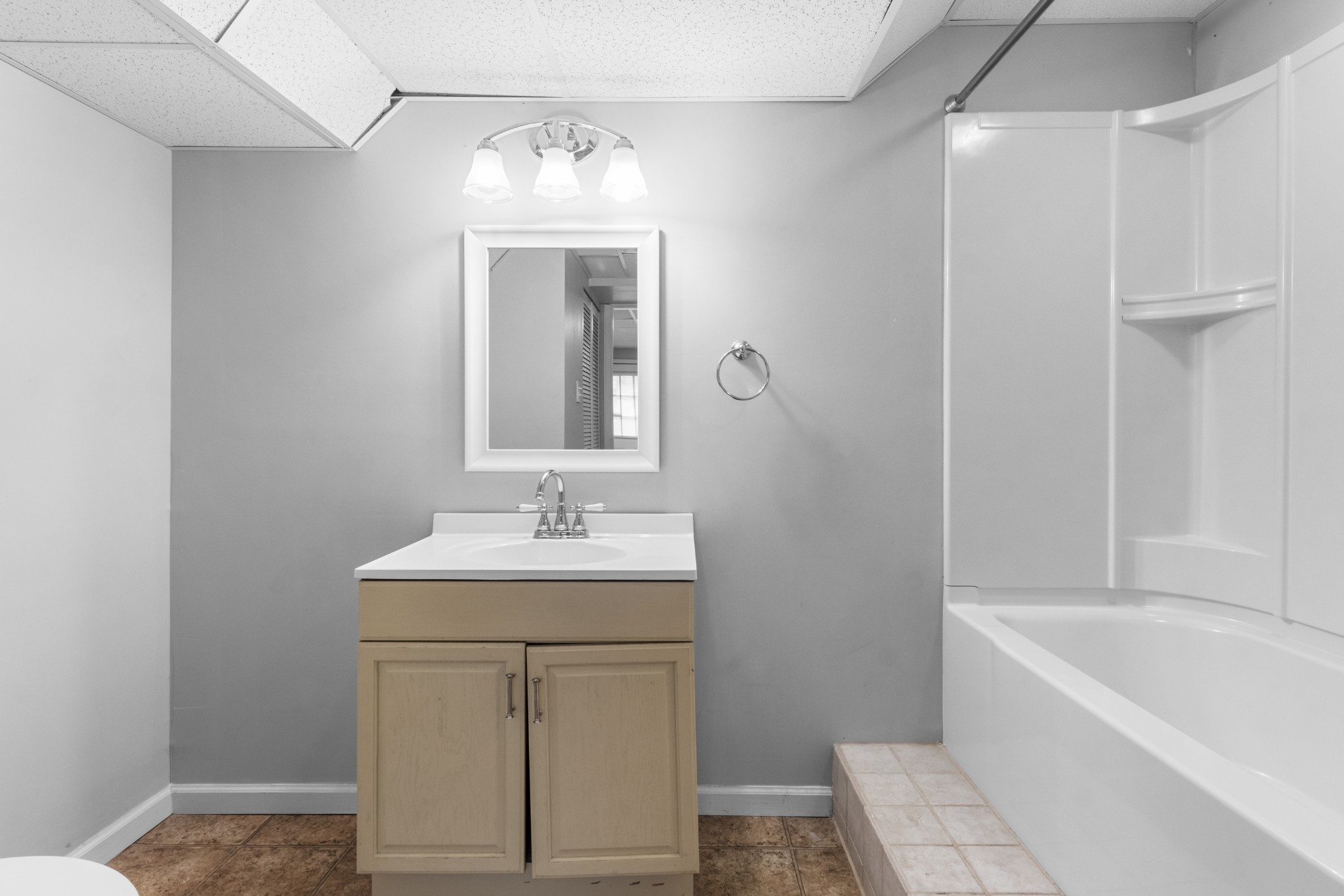 521 Sango Road Clarksville, TN 37043 - Photo 35 of 46 a bathroom with a sink a toilet and shower