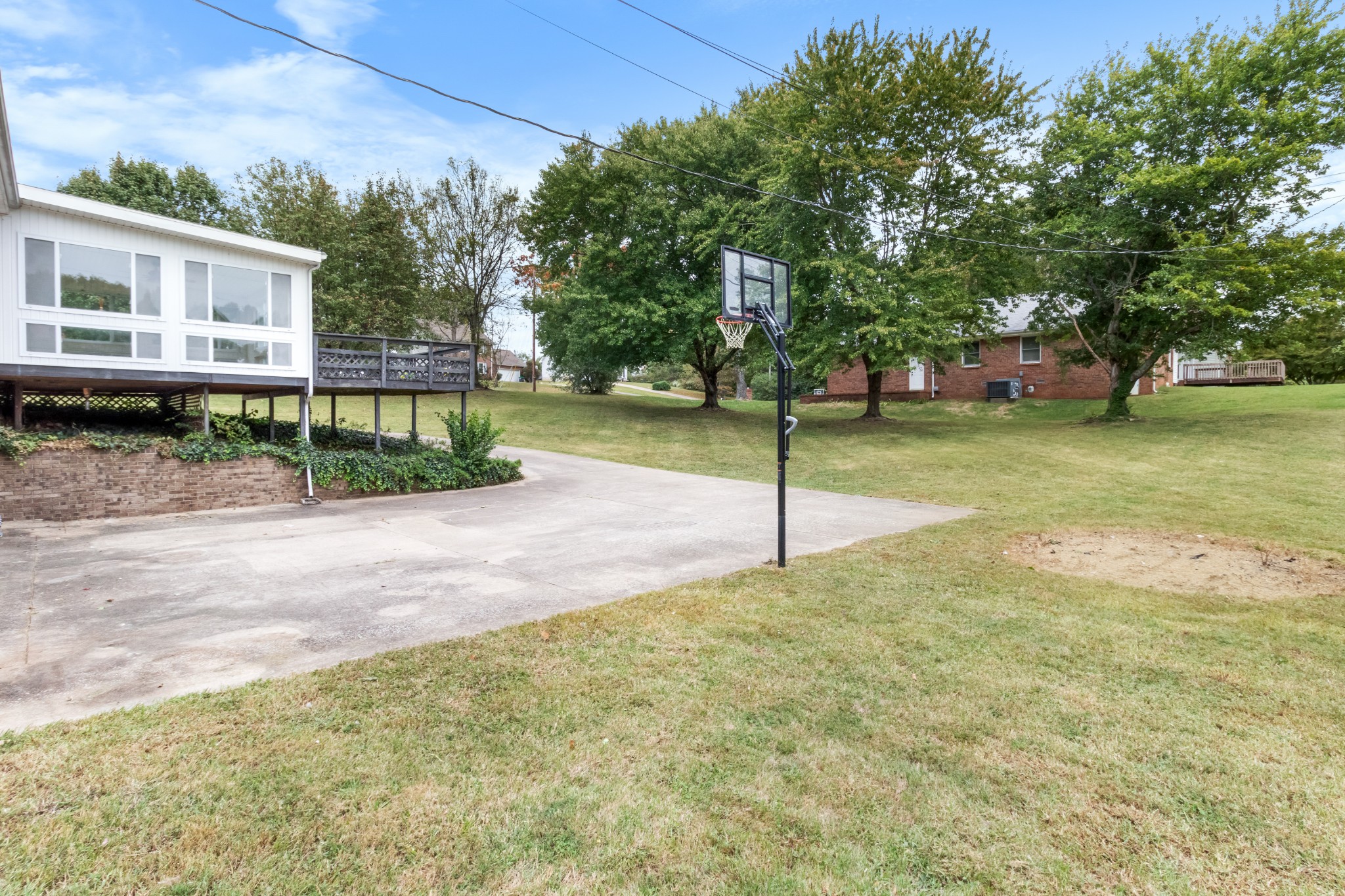 521 Sango Road Clarksville, TN 37043 - Photo 43 of 46 a view of a house with backyard and tree
