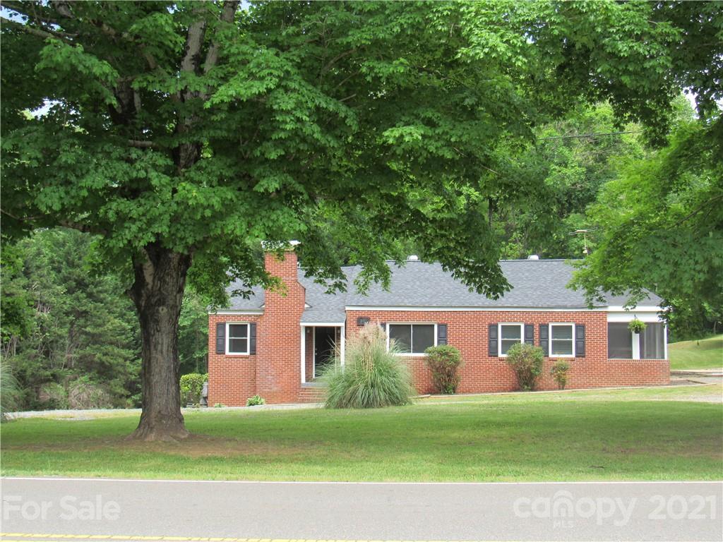 301 Highway 221 Rutherfordton, NC 28139 - Photo 14 of 28 a front view of a house with a garden