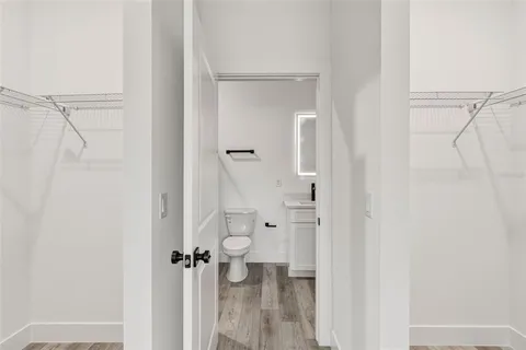 a bathroom with a granite countertop shower