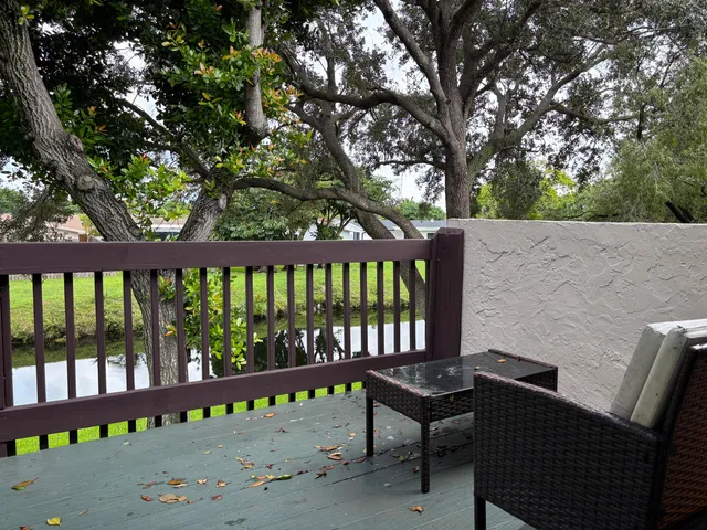 a view of a chairs and table in the outdoor space