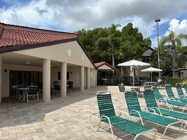 a front view of a house with a patio