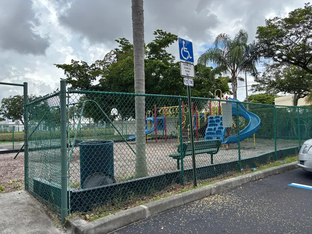 a view of a bench in a park
