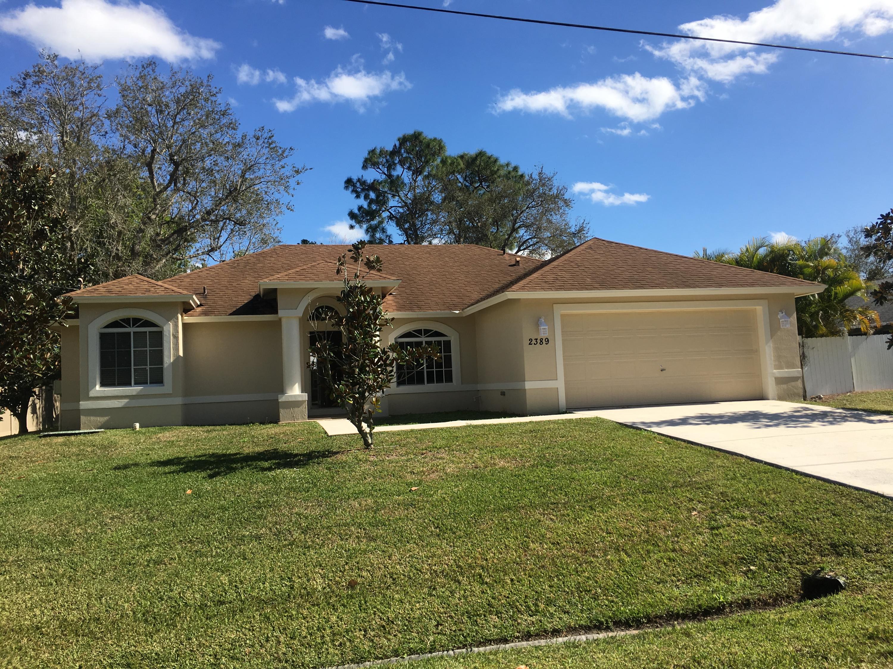 2389 Southwest Independence Road Port St. Lucie, FL 34953 - Photo 1 of 14 front